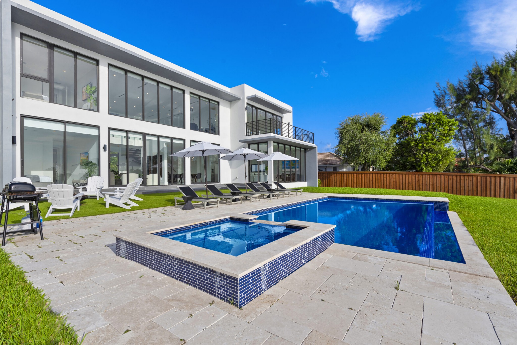 VILLA LAGO pool side sitting area LUXURY MANSION RENTAL, Miami